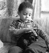 Young child with guinea pig